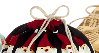 photo of presents wrapped in newspaper or cloth